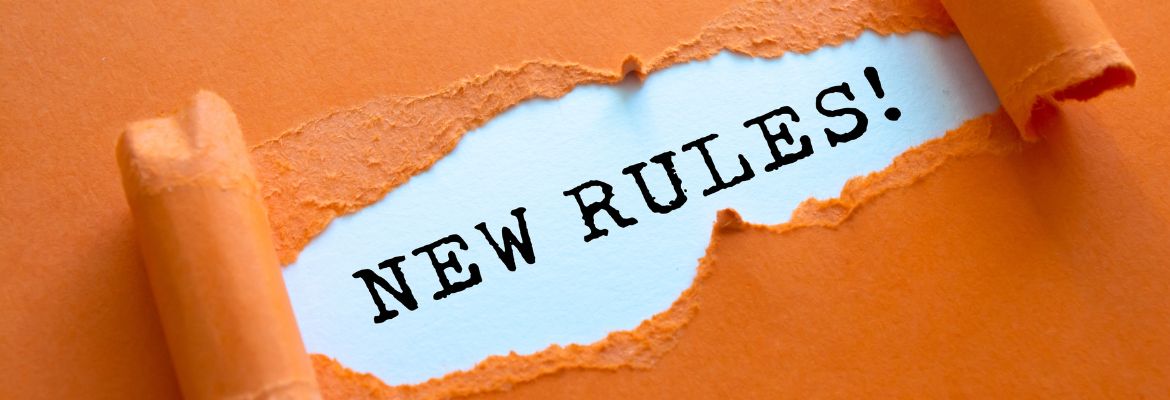 Text sign showing the words "New Rules"