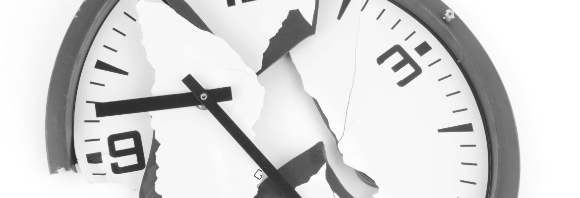 Broken clock on a white background