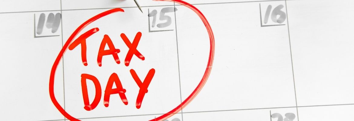 Tax Day inscription on a calendar board